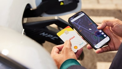 Shell Card and man using phone