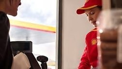 Person at shell shop
