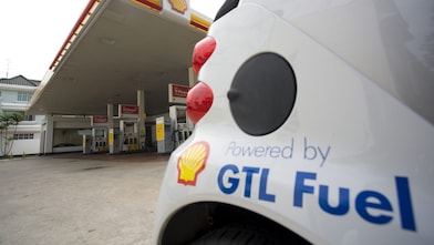 White car with GTL Fuel logo parked on a shell station forecourt,Singapore 2008