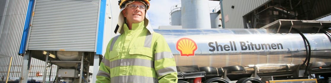 Truck driver with Shell bitumen tank