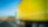 Yellow truck driving on road