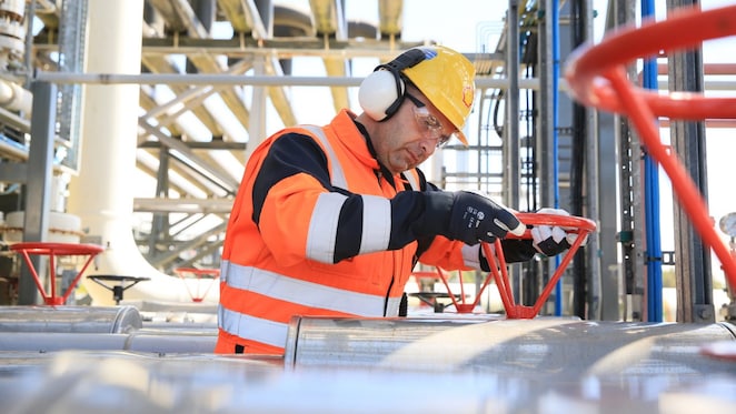 engineer working on a pipeline