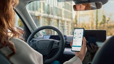 woman consulting the shell recharge app