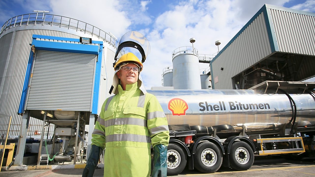 Truck driver with Shell bitumen tank