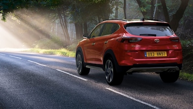 A red Maserati speeds uphill in the Shell Helix Ultra film We Know Why You Drive