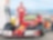 Conducteur de F1 de Ferrari utilisant l'huile Shell Helix Ultra pour faire le plein du véhicule