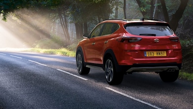 A red Maserati speeds uphill in the Shell Helix Ultra film We Know Why You Drive